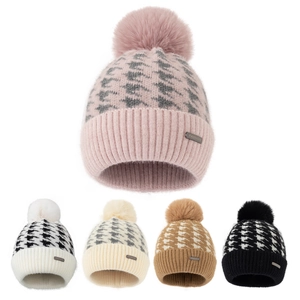 Winter knitted houndstooth beanie with faux fur pompom and metal brand logo