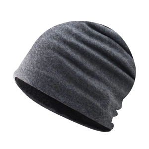 Dark grey knitted beanie with warm fleece lining for men and women in winter