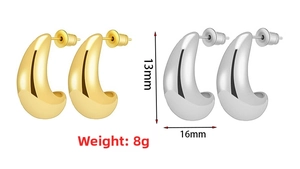 Detail view of gold and silver C-shaped chunky earrings with 13mm and 16mm measurements
