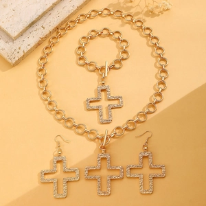 Golden jewelry set with textured cross pendant necklace, bracelet and earrings