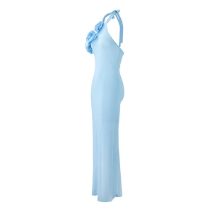 Detail of light blue halter neck dress featuring 3D floral accents and sleek side slit