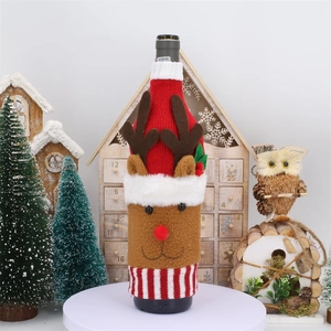Knitted reindeer Christmas wine bottle cover featuring plush details and 3D antlers
