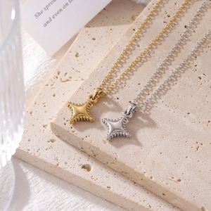 Chic gold and silver titanium steel mini star pendant necklaces on a stone plate