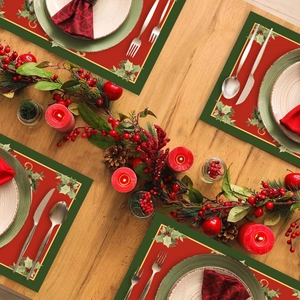 Set of 4 red Christmas placemats with green holly leaf borders and gold metallic trim