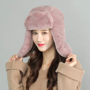 Pink plush trapper hat with thickened ear flaps for winter warmth and wind protection