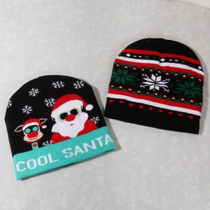 Christmas knit beanies featuring Cool Santa and snowflake patterns in black and red