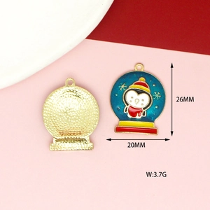 Detail view of 26x20mm Christmas penguin snowflake globe pendant in alloy finish