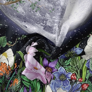 Detail of bohemian tapestry fabric showing vibrant lilies and moon phases pattern