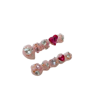 Sweet pink glitter resin hair clips with red heart rhinestones in a two-piece set