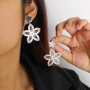 Elegant 18K silver hollow flower drop earrings for women with delicate cutout design