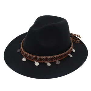 Detail of black felt fedora featuring ethnic woven band and silver metal coin charms