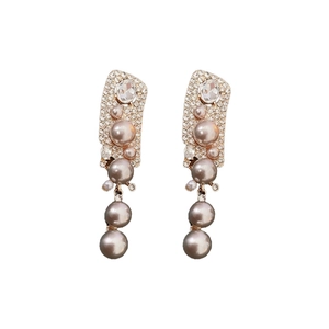 Elegant vertical pearl drop earrings with sparkling rhinestones and champagne pearls