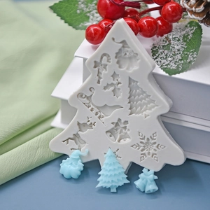 Christmas silicone mold featuring Santa and tree shapes for festive cake baking DIY