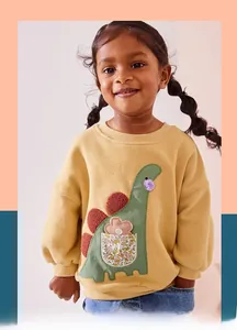 Detail of yellow toddler sweatshirt featuring 3D dinosaur embroidery and floral pocket