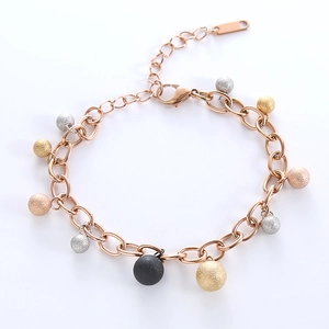 Elegant rose gold chain bracelet featuring matte multicolor steel beads on white background
