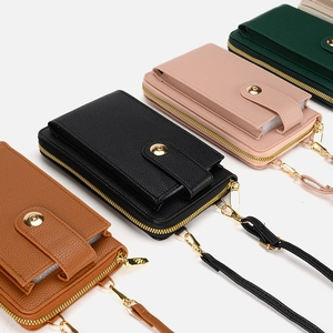 Crossbody phone bags in brown, black, pink, and green with textured PU leather finish