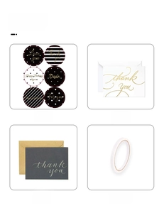 Detailed set of black thank you stickers, greeting cards with envelopes, and double-sided tape