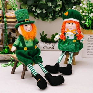 Detail of St. Patrick's Day plush dolls with green hats and striped long legs