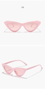 Detail view of pink cat eye sunglasses showing front and 45-degree angle stylish frames
