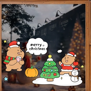Christmas window stickers set featuring cute bears, snowman and tree on glass