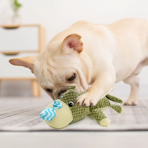 Green crocodile squeaky dog toy made of durable corn velvet for puppy teething and play