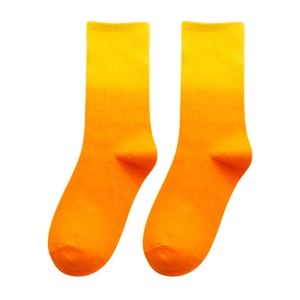 Unisex yellow and orange gradient crew socks featuring a ribbed knit tie-dye design