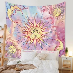 Bedroom wall decor featuring a bohemian sun and moon tapestry with celestial star patterns