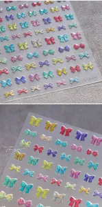 Detail of M-650 holographic bow nail stickers with shimmering 3D glitter finish