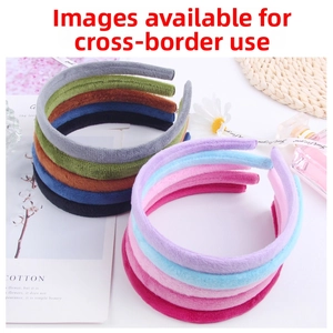Detail showing colorful velvet headbands with soft fabric texture in nine pastel shades