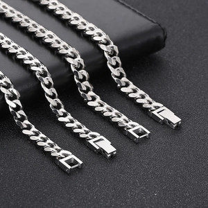 Parallel silver Cuban link chains in various widths with box clasp on black leather