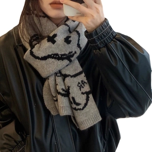 Chic grey knitted long scarf with black graffiti smiley faces for winter warmth
