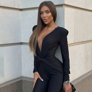 Detail view of black deep V-neck long sleeve bodysuit with waist twist knot feature