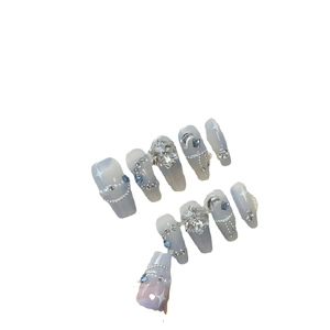 Handmade gradient blue press-on nails with snowflakes, crystals and silver moon charms