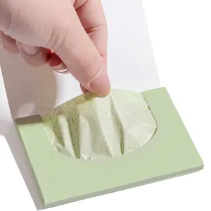 Portable green tea oil absorbing tissues in a compact box for face oil control