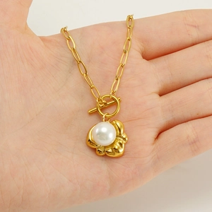 Elegant gold titanium necklace with pearl pendant and OT buckle toggle clasp