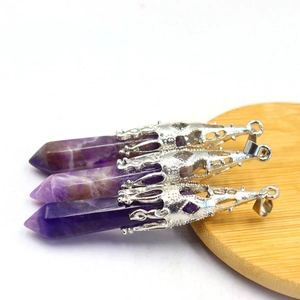 Three natural amethyst hexagonal prism pendants with silver metal filigree ornaments