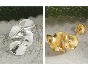Macro shot of S925 sterling silver stamp on irregular flowing ruffle stud earrings