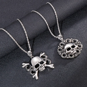 Vintage gothic pirate skull pendants with crossbones and filigree on silver twist chains