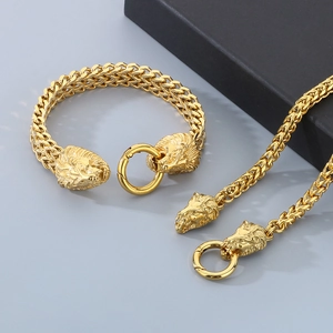 Gold stainless steel lion head bracelet and necklace set with braided chain design