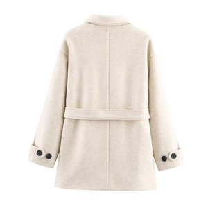 Back view of beige wool coat featuring a decorative waist belt and buttoned cuffs