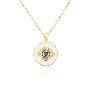 Macro detail of 18K gold plated evil eye pendant with white enamel and blue zircon stones