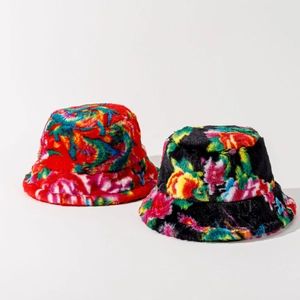 Fuzzy floral bucket hat in plush faux fur featuring vibrant red and black patterns