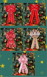 Detail view of five double-layer burlap Christmas bows with reindeer and snowflake patterns