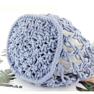 Blue handmade macrame straw beach bag with thick cotton rope weave and round base