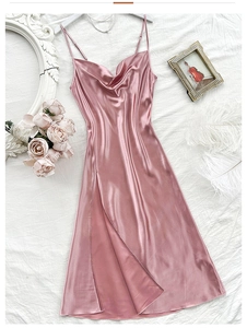 Detail of dusty pink satin slip dress featuring elegant cowl neck and side slit design