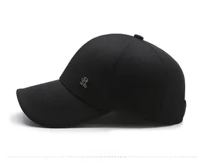 Detailed side view of black cotton baseball cap showing the metallic SR logo emblem