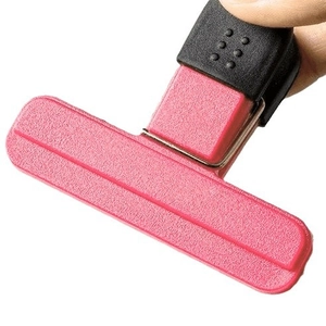 Pink and black T-shaped food sealing clips for snack packaging leakproof storage