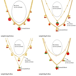 Golden necklaces with red strawberry, cherry, apple and watermelon fruit pendants
