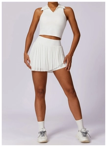 Detail of white pleated tennis skirt and sleeveless polo shirt set for outdoor sports