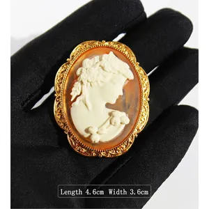 Vintage cameo brooch and necklace with lady relief in gold frame measuring 4.6cm x 3.6cm